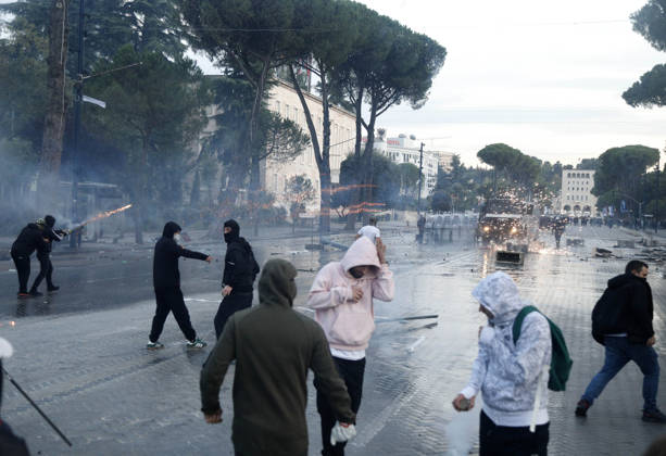Protesters Clash with Police During a Demonstration in Tirana, Albania. Protesters throw stones at riot police during an anti-government demonstration in central Tirana on October 15, 2026, as protests continued for a third consecutive day over university conditions and demands for the resignation of Albanian Prime Minister Edi Rama. The latest rally follows two nights of violence in the capital, during which protesters and riot police clashed, police used water cannons and tear gas, and demonstrators damaged government offices and shops and set fire to several buildings. Light Studio Agency Malton Dibra Tirana Albania Copyright: xLightxStudioxAgencyx xMaltonxDibrax