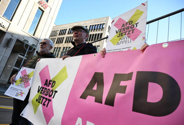 Rally calling for an AfD ban in Berlin BERLIN, GERMANY - OCTOBER 16: People take part in a rally near the Bundesrat calling for proceedings to ban the far-right Alternative for Germany (AfD) party and urge North Rhine-Westphalia Minister-President Hendrik Wüst to support their demand, as he is set to be elected President of the Bundesrat that day, in Berlin, Germany, on 16 October 2026. The rally is organized by the alliance NRW Appeal: AfD Ban Now, which reportedly collected more than 120,000 signatures in support of an AfD ban in North Rhine-Westphalia and is urging the Bundesrat to initiate proceedings before the Federal Constitutional Court to ban the party. Volodymyr Sindieiev Anadolu Berlin Germany. Editorial use only. Please get  Copyright: x2026xAnadoluxVolodymyrxSindieievx