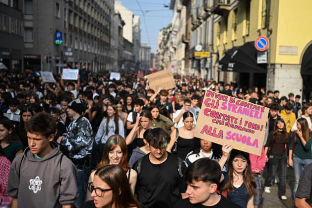 Nationwide school strike in Milan MILAN, ITALY - OCTOBER 16: Students hold placards during a nationwide school strike in Milan, Italy, on October 16, 2026. Protesters oppose the government s education policies and measures they consider discriminatory towards students of foreign origin, also highlighting demands for higher wages and an end to precarious employment in schools. Piero Cruciatti Anadolu Milan Italy. Editorial use only. Please get in touch for any other usage.  Copyright: x2026xAnadoluxPieroxCruciattix