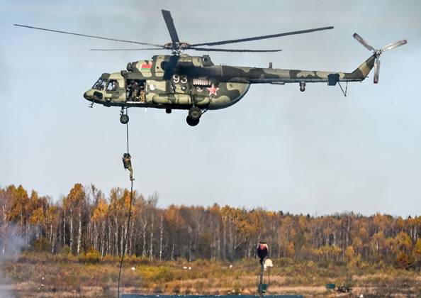 Belarus CSTO Drills 9265864 16.10.2026 A Mil Mi-8 helicopter flies during the command-and-staff exercise with the CSTO peacekeeping forces Indestructible Brotherhood-2026 at the Losvido training ground in Vitebsk Region, Belarus. Viktor Tolochko Sputnik Vitebsk region Belarus  Copyright: xViktorxTolochkox