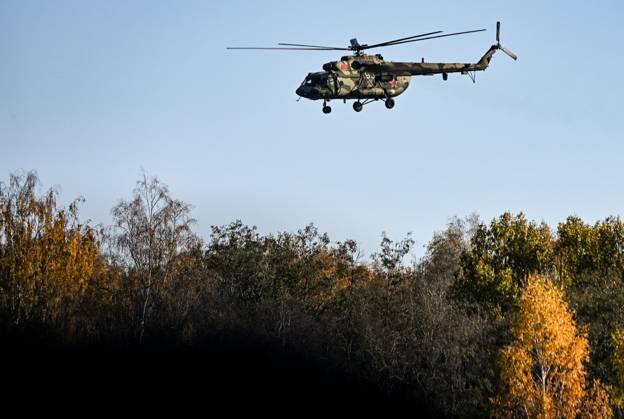 Belarus CSTO Drills 9265867 16.10.2026 A Mil Mi-8 helicopter flies during the command-and-staff exercise with the CSTO peacekeeping forces Indestructible Brotherhood-2026 at the Losvido training ground in Vitebsk Region, Belarus. Viktor Tolochko Sputnik Vitebsk region Belarus  Copyright: xViktorxTolochkox