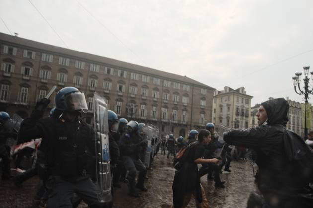 October 16, 2026, Turin, Italy: TURIN, ITALY, OCTOBER 16, 2026: Students demonstrate against deteriorating school buildings, insufficient education funding and job insecurity, calling for greater investment in education rather than military spending. Clashes break out in Piazza Castello, where police use water cannons and charge demonstrators. Earlier along the route, teachers link arms between students and police to prevent confrontation. Turin Italy - ZUMAq101 20261016_zna_q101_130 Copyright: xJulianxNelajx