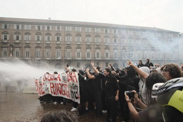 October 16, 2026, Turin, Italy: TURIN, ITALY, OCTOBER 16, 2026: Students demonstrate against deteriorating school buildings, insufficient education funding and job insecurity, calling for greater investment in education rather than military spending. Clashes break out in Piazza Castello, where police use water cannons and charge demonstrators. Earlier along the route, teachers link arms between students and police to prevent confrontation. Turin Italy - ZUMAq101 20261016_zna_q101_147 Copyright: xJulianxNelajx