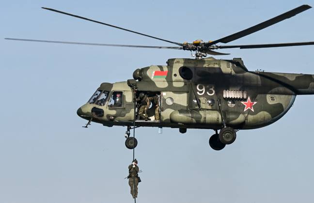 Belarus CSTO Drills 9265866 16.10.2026 A serviceman fast ropes from an Mil Mi-8 helicopter during the command-and-staff exercise with the CSTO peacekeeping forces Indestructible Brotherhood-2026 at the Losvido training ground in Vitebsk Region, Belarus. Viktor Tolochko Sputnik Vitebsk region Belarus  Copyright: xViktorxTolochkox