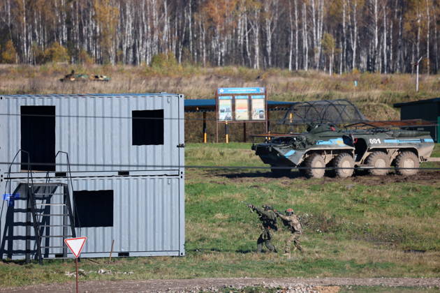 BELARUS - OCTOBER 16, 2026: Servicemen appear next to an armoured vehicle in the final live training phase of the Indestructible Brotherhood 2026 command-and-staff military exercise by the CSTO Peacekeeping Forces at the Losvido military training ground Belarus  - ZUMAt113 20261016_zaa_t113_220 Copyright: xMaximxMalinovskyx