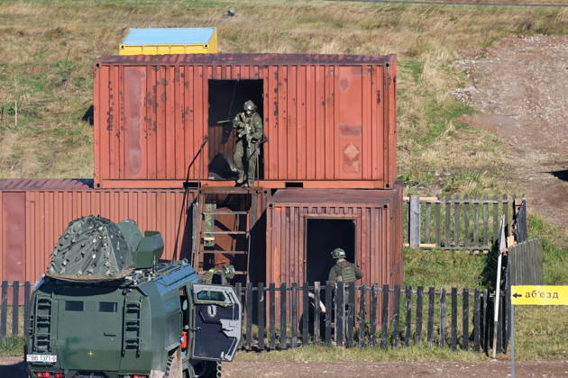 BELARUS - OCTOBER 16, 2026: Servicemen appear next to an armoured vehicle in the final live training phase of the Indestructible Brotherhood 2026 command-and-staff military exercise by the CSTO Peacekeeping Forces at the Losvido military training ground Belarus  - ZUMAt113 20261016_zaa_t113_252 Copyright: xMaximxMalinovskyx