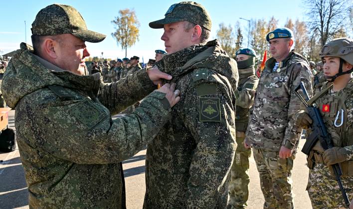 Belarus CSTO Drills 9265911 16.10.2026 Servicemen attend the awarding ceremony following the command-and-staff exercise with the CSTO peacekeeping forces Indestructible Brotherhood-2026 at the Losvido training ground in Vitebsk Region, Belarus. Viktor Tolochko Sputnik Vitebsk region Belarus  Copyright: xViktorxTolochkox