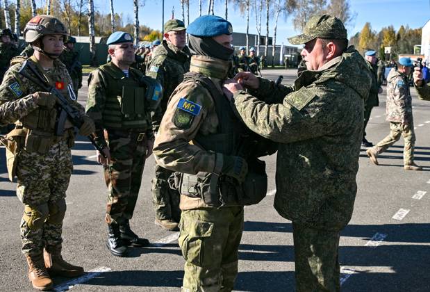 Belarus CSTO Drills 9265913 16.10.2026 Servicemen attend the awarding ceremony following the command-and-staff exercise with the CSTO peacekeeping forces Indestructible Brotherhood-2026 at the Losvido training ground in Vitebsk Region, Belarus. Viktor Tolochko Sputnik Vitebsk region Belarus  Copyright: xViktorxTolochkox