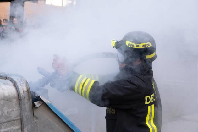 IPA89764837 - Firefighters put out a fire inside a trash can during a student strike. Bologna, Italy, October 16, 2026.  Copyright: xLeonardoxGaravaglia LiveMediax xLeonardoxGaravaglia LiveMediax IPA89764837