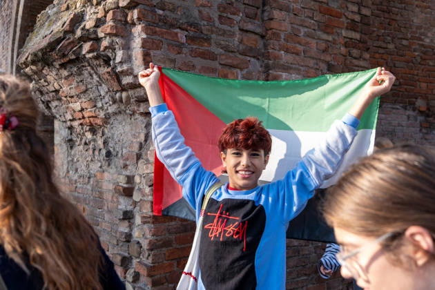 IPA89764844 - A student waves the Palestinian flag during a student strike. Bologna, Italy, October 16, 2026.  Copyright: xLeonardoxGaravaglia LiveMediax xLeonardoxGaravaglia LiveMediax IPA89764844