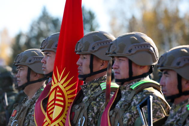 BELARUS - OCTOBER 16, 2026: Servicemen appear with a national flag of Kyrgyzstan in the final live training phase of the Indestructible Brotherhood 2026 command-and-staff military exercise by the CSTO Peacekeeping Forces at the Losvido military training ground Belarus  - ZUMAt113 20261016_zaa_t113_286 Copyright: xMaximxMalinovskyx