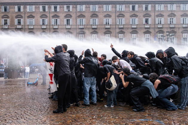 October 16, 2026, Turin, Piedmont, Italy: After days of occupations at many high schools across the city, following the French model, on Friday, October 16, in Turin, thousands of students took to the streets to protest the lack of resources in the school system and the inadequate condition of school buildings. The protesters marched through the city, stopping in front of Porta Susa, where teachers formed a human chain to separate them from the police. Lastly, in Piazza Castello, the police used water cannons and tear gas to disperse the demonstration, which had arrived outside the police headquarters. Turin Italy - ZUMAs377 20261016_znp_s377_040 Copyright: xPietroxStariccox