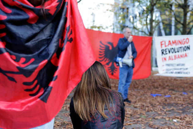 Solidarity Protest for Albania held in Berlin. A protester speaks in front of the Albanian flag as people gather opposite the Albanian embassy during a protest organized by ˜Flamingos von Berlin™ in Berlin, Germany, 16 October 2026. The organizers called for solidarity with students in Albania and denounced corruption, demanding the resignation of Edi Rama. Berlin