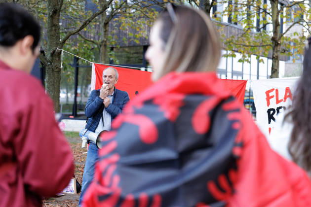 Solidarity Protest for Albania held in Berlin. A protester speaks in front of the Albanian flag as people gather opposite the Albanian embassy during a protest organized by ˜Flamingos von Berlin™ in Berlin, Germany, 16 October 2026. The organizers called for solidarity with students in Albania and denounced corruption, demanding the resignation of Edi Rama. Berlin