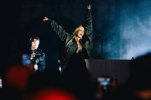 Belgian singer Angele pictured during the Angele Instinct Release Party , a surprise party organized by the Brussels singer to celebrate the release of her album Instinct at the Grote Markt Grand Place, in Brussels, Friday 16 October 2026.  EMILExWINDAL 190025640