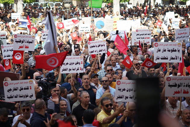 October 17, 2026, Tunis, Tunis, Tunisia, Tunisia: Demonstrators take to the streets of Tunis during a march calling for social and economic reforms and the protection of civil liberties, amid public concerns over rising living costs, workersâ€⠢ rights and freedom of expression on October 17, 2026. Organized by trade unions, journalistsâ€⠢ representatives, lawyers and civil society groups, the demonstration brings together protesters demanding accountability and defending fundamental rights. The march highlights ongoing concerns over Tunisiaâ€⠢s economic situation and the space for public dissent. Tunis Tunisia - ZUMAm342 20261017_zsp_m342_037 Copyright: xHasanxMradx