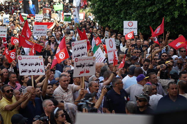 October 17, 2026, Tunis, Tunis, Tunisia, Tunisia: Demonstrators take to the streets of Tunis during a march calling for social and economic reforms and the protection of civil liberties, amid public concerns over rising living costs, workers™ rights and freedom of expression on October 17, 2026. Organized by trade unions, journalists™ representatives, lawyers and civil society groups, the demonstration brings together protesters demanding accountability and defending fundamental rights. The march highlights ongoing concerns over Tunisia™s economic situation and the space for public dissent. Tunis Tunisia - ZUMAm342 20261017_zsp_m342_038 Copyright: xHasanxMradx