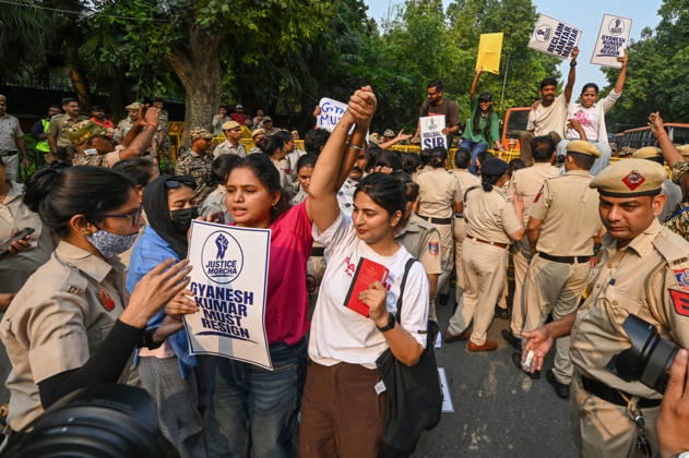 NEW DELHI, INDIA - OCTOBER 17: Delhi Police and paramilitary personnel detain members and workers of various organisations during a protest against Chief Election Commissioner Gyanesh Kumar and the Special Intensive Revision (SIR) of electoral rolls on Raisina Road on October 17, 2026 in New Delhi, India. (Photo by Raj K Raj Hindustan Times ) CJP Supporters Protest Demanding CEC Gyanesh Kumar s Resignation Over Voter List Changes