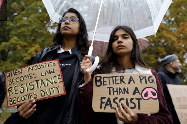 October 17, 2026, Berlin, Germany: BERLIN, GERMANY - OCTOBER 17, 2026: A small group of demonstrators hold placards at Oranienplatz in the Kreuzberg district to show solidarity with mass protests in India and to protest against the crackdown on them, as several people take the floor to discuss the situation. The demonstration followed a call by Neha Bora, president of the All India Studentsâ€⠢ Association (AISA), for people everywhere to back the protests, saying â€oeeverywhere is Jantar Mantarâ€Â, the site in Delhi where the main protests are taking place. The protests demand the resignation of Chief Election Commissioner Gyanesh Kumar over a revision of electoral rolls that opponents say led to the mass deletion of voters, whi - ZUMAq101 20261017_zna_q101_067 Copyright: xAlessiaxCoccax