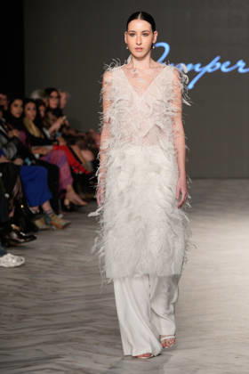 (261018) -- VANCOUVER, Oct. 18, 2026 -- A model presents a creation by Chinese fashion designer Jumper Zhang during Vancouver Fashion Week 2026 in Vancouver, British Columbia, Canada, on Oct. 17, 2026. (Photo by Liang Sen Xinhua) CANADA-VANCOUVER FASHION WEEK 2026 LinxWei 
