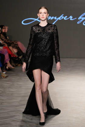 (261018) -- VANCOUVER, Oct. 18, 2026 -- A model presents a creation by Chinese fashion designer Jumper Zhang during Vancouver Fashion Week 2026 in Vancouver, British Columbia, Canada, on Oct. 17, 2026. (Photo by Liang Sen Xinhua) CANADA-VANCOUVER FASHION WEEK 2026 LinxWei 