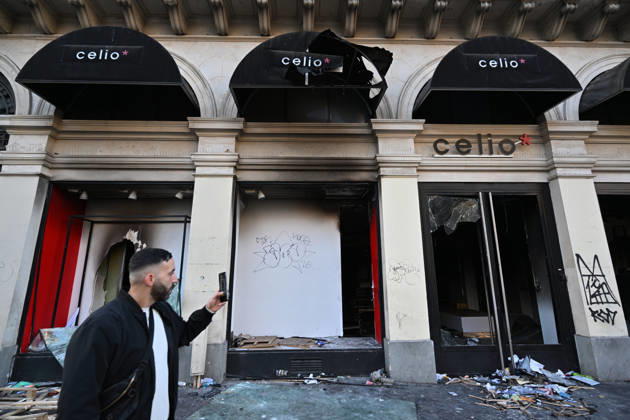 Aftermath of clashes during nationwide protests in Paris PARIS, FRANCE - OCTOBER 18: A man takes a photo of a vandalised store following clashes during nationwide protests against the high cost of living and rising fuel prices in Paris, France on October 18, 2026. Mustafa Yalcin Anadolu Paris France. Editorial use only. Please get in touch for any other usage.  Copyright: x2026xAnadoluxMustafaxYalcinx