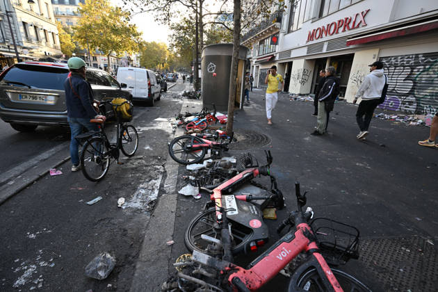 Aftermath of clashes during nationwide protests in Paris PARIS, FRANCE - OCTOBER 18: People walk past burnt-out bicycles following clashes during nationwide protests against the high cost of living and rising fuel prices in Paris, France on October 18, 2026. Mustafa Yalcin Anadolu Paris France. Editorial use only. Please get in touch for any other usage.  Copyright: x2026xAnadoluxMustafaxYalcinx