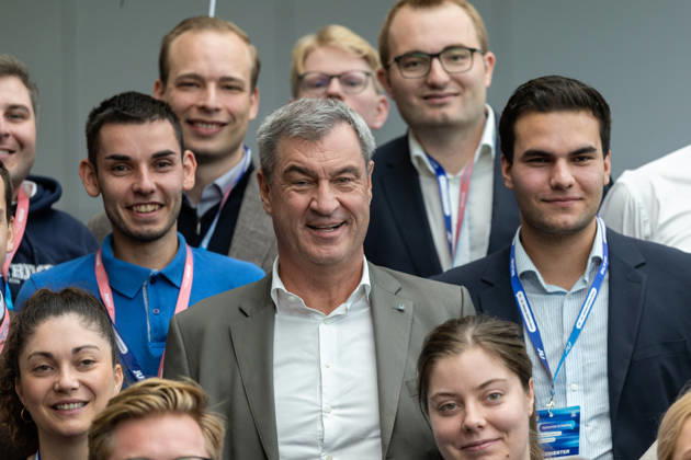 Markus Söder in a group photo with the Bavarian State Association at the Junge Union’s Germany Day in Bonn on October 18, 2026. Bavarian Minister-President and CSU Chair Markus SÖDER (CSU), is pictured in the center of a group photo with delegates from the Bavarian State Associa Copyright: xMarcxJohnx