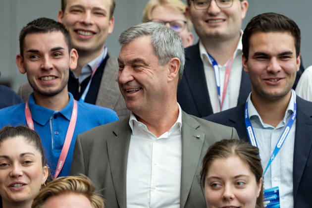 Markus Söder in a group photo with the Bavarian State Association at the Junge Union’s Germany Day in Bonn on October 18, 2026. Bavarian Minister-President and CSU Chair Markus SÖDER (CSU), is pictured in the center of a group photo with delegates from the Bavarian State Associa Copyright: xMarcxJohnx