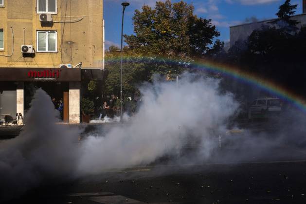 October 18, 2026, Tirana, Albania: TIRANA, ALBANIA, OCTOBER 18, 2026: Demonstrators clash with riot police outside the Ministry of Education in Tirana as student-led anti-government protests continue for a sixth consecutive day. Protesters throw stones while police respond with tear gas, water cannons and rubber bullets. The demonstrations demand improved university conditions and the resignation of Prime Minister Edi Rama. Tirana Albania  - ZUMAq101 20261018_zna_q101_066 Copyright: xVlasovxSulajx