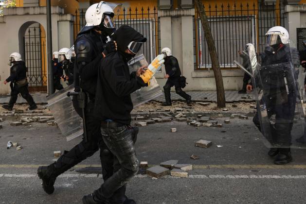 October 18, 2026, Tirana, Albania: TIRANA, ALBANIA, OCTOBER 18, 2026: Demonstrators clash with riot police outside the Ministry of Education in Tirana as student-led anti-government protests continue for a sixth consecutive day. Protesters throw stones while police respond with tear gas, water cannons and rubber bullets. The demonstrations demand improved university conditions and the resignation of Prime Minister Edi Rama. Tirana Albania  - ZUMAq101 20261018_zna_q101_069 Copyright: xVlasovxSulajx