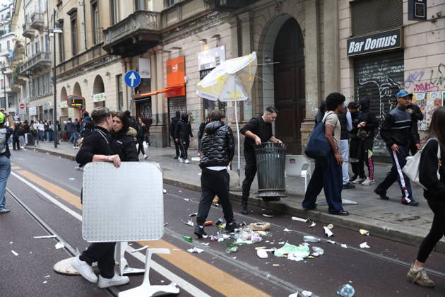 RECORD DATE NOT STATED IPA89862310 - Milan: Clashes and looting by hooded youths continued in the city center the day after the demonstration on Saturday, the 17th; many hooded individuals were detained and taken to police headquarters. Copyright: xx xFrancescoxEnriquezx IPA89862310.jpeg