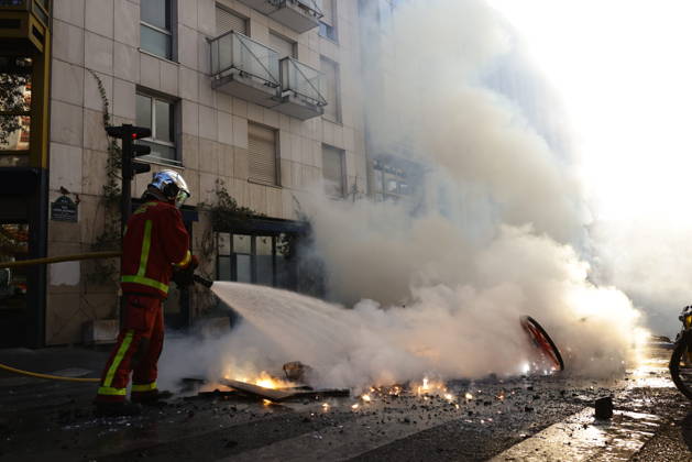 Aftermath of clashes during nationwide protests in Paris PARIS, FRANCE - OCTOBER 18: Firefighters extinguish fires set to bicycles and street debris as streets across Paris show signs of damage following a day of violent clashes between police and protesters amid a nationwide mobilization over rising living costs, fuel prices, and education funding in Paris, France, on October 18, 2026. Ibrahim Ezzat Anadolu Paris France. Editorial use only. Please get in touch for any other usage.  Copyright: x2026xAnadoluxIbrahimxEzzatx