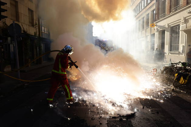Aftermath of clashes during nationwide protests in Paris PARIS, FRANCE - OCTOBER 18: Firefighters extinguish fires set to bicycles and street debris as streets across Paris show signs of damage following a day of violent clashes between police and protesters amid a nationwide mobilization over rising living costs, fuel prices, and education funding in Paris, France, on October 18, 2026. Ibrahim Ezzat Anadolu Paris France. Editorial use only. Please get in touch for any other usage.  Copyright: x2026xAnadoluxIbrahimxEzzatx