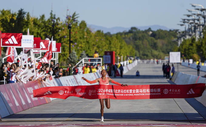 (261018) -- BEIJING, Oct. 18, 2026 -- Anchinalu Dessie Genaneh of Ethiopia crosses the finish line to win the first place of the women s marathon event at the 2026 Beijing Marathon & National Marathon Championships in Beijing, capital of China, Oct. 18, 2026. ) (SP)CHINA-BEIJING-2026 BEIJING MARATHON (CN) MaxXiaodong