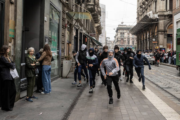 Police detain 160 as unrest continues for second day in Milan MILAN, ITALY - OCTOBER 18: Young protesters flee from police as they run through the streets, damaging shops and public property during urban unrest in Milan, Italy, on October 18, 2026, a day after protests against the rising cost of living. Groups threw stones, bottles, firecrackers and barriers at officers, who responded with tear gas and water cannon. Shops were damaged and looted around the city center, while a Carabinieri vehicle was destroyed. Andrea Carrubba Anadolu Milan Italy. Editorial use only. Please get in touch for any other usage. Copyright: x2026xAnadoluxAndreaxCarrubbax