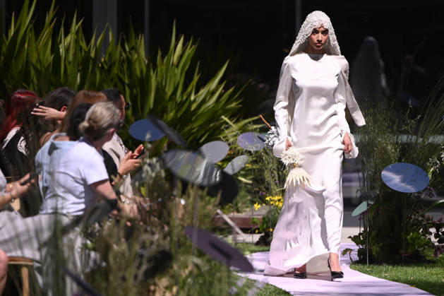 MELBOURNE FASHION WEEK PREVIEW, A model walks the runway during a 2026 Melbourne Fashion Week Runway Preview, at Sky Park, Melbourne, Monday, October 19, 2026. The preview features a selection of the upcoming collections that will appear on M FW runways including designers OUT OF HAND x Lisa Waup, Ebony Noire, Van Ermel Scherer, Perple, Gotham, Wilson Jedd Adams, Asiyam, Atoir, NGALI, Kuwaii, HoMie, Collective Closets x Mariam Farah, TOJHÃÄ, Amy Cottrell, BAAQIY and Sean Rentero. ( NO ARCHIVING MELBOURNE VICTORIA Australia  Copyright: xJOELxCARRETTx 20261019131703415080