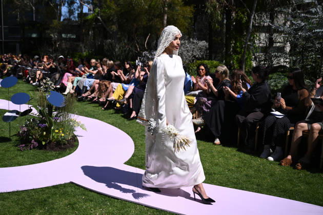 MELBOURNE FASHION WEEK PREVIEW, A model walks the runway during a 2026 Melbourne Fashion Week Runway Preview, at Sky Park, Melbourne, Monday, October 19, 2026. The preview features a selection of the upcoming collections that will appear on M FW runways including designers OUT OF HAND x Lisa Waup, Ebony Noire, Van Ermel Scherer, Perple, Gotham, Wilson Jedd Adams, Asiyam, Atoir, NGALI, Kuwaii, HoMie, Collective Closets x Mariam Farah, TOJHÃÄ, Amy Cottrell, BAAQIY and Sean Rentero. ( NO ARCHIVING MELBOURNE VICTORIA Australia  Copyright: xJOELxCARRETTx 20261019154393995090