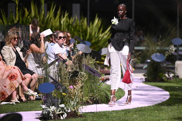 MELBOURNE FASHION WEEK PREVIEW, A model walks the runway during a 2026 Melbourne Fashion Week Runway Preview, at Sky Park, Melbourne, Monday, October 19, 2026. The preview features a selection of the upcoming collections that will appear on M FW runways including designers OUT OF HAND x Lisa Waup, Ebony Noire, Van Ermel Scherer, Perple, Gotham, Wilson Jedd Adams, Asiyam, Atoir, NGALI, Kuwaii, HoMie, Collective Closets x Mariam Farah, TOJHÃÄ, Amy Cottrell, BAAQIY and Sean Rentero. ( NO ARCHIVING MELBOURNE VICTORIA Australia  Copyright: xJOELxCARRETTx 20261019148069176376
