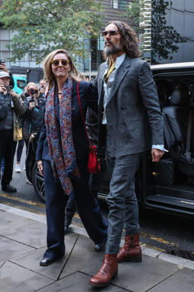 October 19, 2026, London, England, United Kingdom: RUSSELL BRAND and his wife, LAURA BRAND, arrive together at Southwark Crown Court in London, on October 19, 2026, for his trial on rape and sexual assault charges, which he denies. London United Kingdom - ZUMAa279 20261019_zsp_a279_001 Copyright: xZeynepxDemirxAslimx