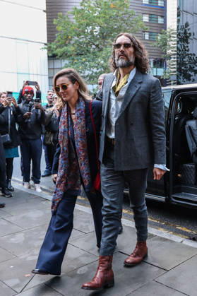 October 19, 2026, London, England, United Kingdom: RUSSELL BRAND and his wife, LAURA BRAND, arrive together at Southwark Crown Court in London, on October 19, 2026, for his trial on rape and sexual assault charges, which he denies. London United Kingdom - ZUMAa279 20261019_zsp_a279_005 Copyright: xZeynepxDemirxAslimx