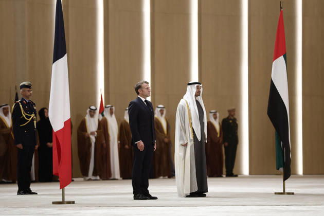 President Macron Visit To Middle East - Abu Dhabi Sheikh Mohamed bin Zayed Al Nahyan, President of the United Arab Emirates (UAE), and French President Emmanuel Macron review troops upon Macron s arrival at Zayed International Airport in Abu Dhabi, United Arab Emirates, October 19, 2026. Photo by Benoit Tessier Pool ABACAPRESS.COM Abu Dhabi United Arab Emirates  Copyright: xTessierxBenoit Pool ABACAx