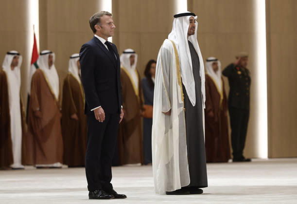 President Macron Visit To Middle East - Abu Dhabi Sheikh Mohamed bin Zayed Al Nahyan, President of the United Arab Emirates (UAE), and French President Emmanuel Macron review troops upon Macron s arrival at Zayed International Airport in Abu Dhabi, United Arab Emirates, October 19, 2026. Photo by Benoit Tessier Pool ABACAPRESS.COM Abu Dhabi United Arab Emirates  Copyright: xTessierxBenoit Pool ABACAx