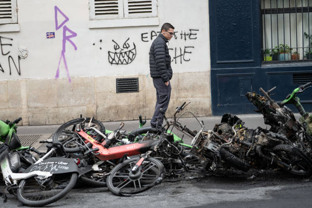 Shops Looted After the October 17th Demonstration - Paris AJ This photo shows a passerby looking at bicycles that have been charred, burned, and destroyed on October 19, 2026 two days after riots and looting occurred (pillage) on the sidelines of nationwide cost-of-living demonstrations. Photo by Alexis Jumeau ABACAPRESS.COM Paris France  Copyright: xJumeauxAlexis ABACAx