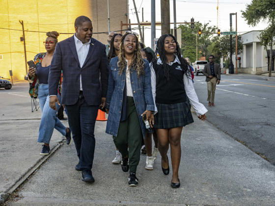 October 19, 2026, Little Rock, Arkansas, USA: Democratic Congressional candidate CHRIS JONES heads to the polls with family and supporters on the first day of early vote in Arkansas. He is joined in the front line with his wife JERRILYN JONES and daughter JANELLE JONES. Daughters JORDYN and JASMINE JONES are behind them. Jones is running for the seat now held by Rep. French Hill (R-AR). Should Jones win, he will be the first Black person Arkansas sends to Congress. Little Rock USA - ZUMAd155 20261019_znp_d155_023 Copyright: xSuexDorfmanx