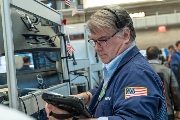 October 19, 2026, New York, New York, USA: A trader works on the trading floor of the New York Stock Exchange (NYSE) during opening hours in New York, NY on October 19, 2026. New York USA  - ZUMAr339 20261019_znp_r339_010 Copyright: xLevxRadinx