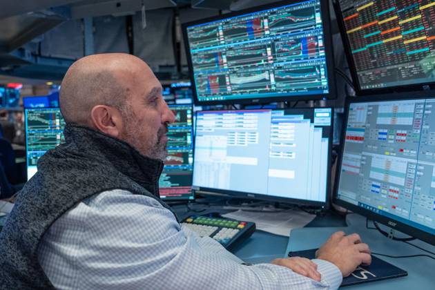 October 19, 2026, New York, New York, USA: A trader works on the trading floor of the New York Stock Exchange (NYSE) during opening hours in New York, NY on October 19, 2026. New York USA - ZUMAr339 20261019_znp_r339_004 Copyright: xLevxRadinx