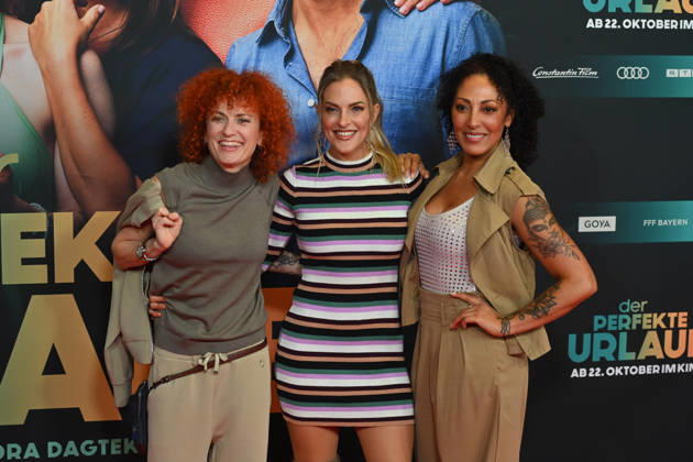 From left: Lucy DIAKOVSKA (No Angels), Sandy MOELLING (No Angels), Jessica WAHLS (No Angels) World premiere of *THE PERFECT VACATION* on October 19, 2026, at the Mathaeser Filmpalast in Munich. Photo call on the red carpet.