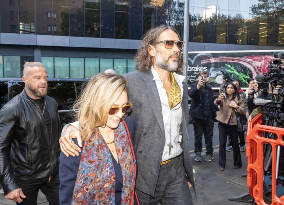 October 19, 2026, London, England, United Kingdom: RUSSELL BRAND with his wife LAURA ((nÃ e GALLACHER ) arrives at Southwark Crown Court, where he is facing three charges of rape, indecent assault, and three counts of sexual assault, relating to six women. London United Kingdom - ZUMAs262 20261019_zip_s262_010 Copyright: xTayfunxSalcix