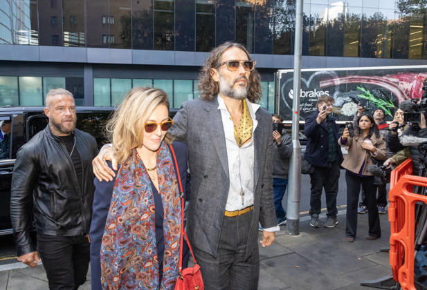 October 19, 2026, London, England, United Kingdom: RUSSELL BRAND with his wife LAURA ((nÃ e GALLACHER ) arrives at Southwark Crown Court, where he is facing three charges of rape, indecent assault, and three counts of sexual assault, relating to six women. London United Kingdom - ZUMAs262 20261019_zip_s262_012 Copyright: xTayfunxSalcix